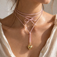 Collana in caucciù con ciondolo